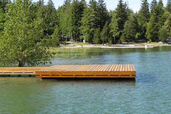 Picture of a floating wooden dock on a lake.