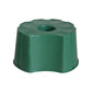 A green plastic garden stake cover or potting base with a circular center hole, shown on a plain white background.