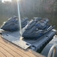 Picture of two personal watercraft vehicles docked on to two Permaport Xpress ports joined together by the Xpress walk and mounted to the floating dock with the Xpress step.