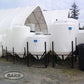 Group of cone bottom tanks with stands at BARR Plastics in Abbotsford, BC