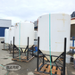 Flat top cone bottom tanks palletized at BARR Plastics in Abbotsford, BC